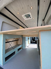 Load image into Gallery viewer, Transit 130&quot; - Lofted Bed with Garage / Systems Cabinets
